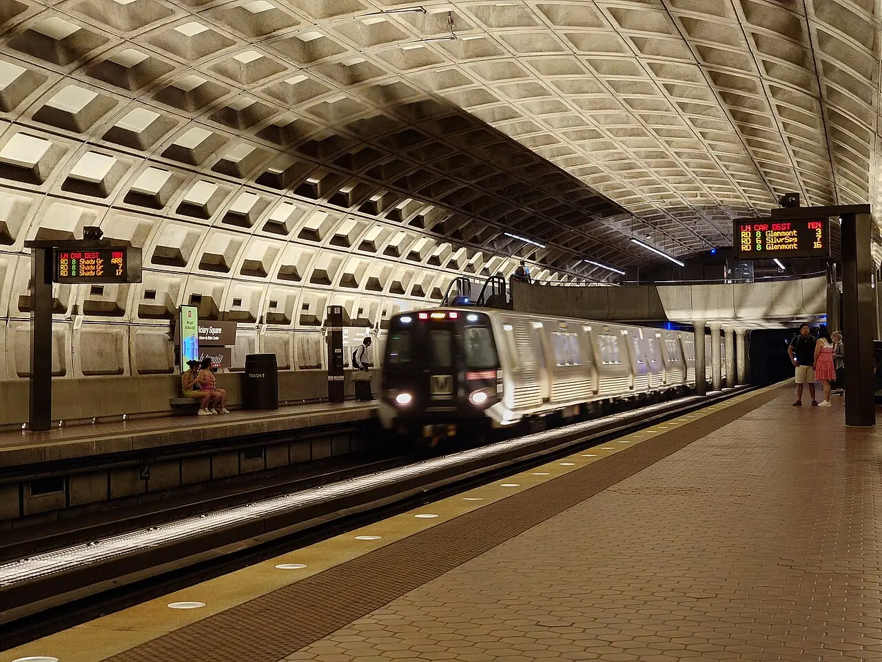 A Metro train arriving at Judiciary Square station.